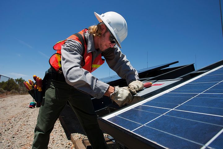 Worker providing commercial solar financing